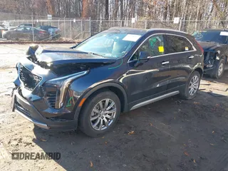 2022 Cadillac XT4 AWD Premium Luxury with VIN 1GYFZDR40NF139931, listed as a IAAI auction lot 41168482 with 28,748 mi miles and . Bid and sale history available at carsss.com. Image 17.