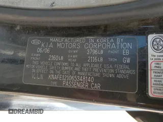 2006 Kia Spectra EX with VIN KNAFE121065348140, listed as a Copart auction lot 70874144 with 181,710 mi miles and Salvage Title. Bid and sale history available at carsss.com. Image 14.