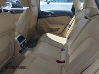 2014 Audi A6 Prestige with VIN WAUHGAFCXEN091050, listed as a IAAI auction lot 42524560 with 169,575 mi miles and . Bid and sale history available at DreamBid. Image 8.