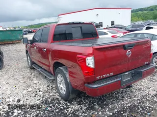 2017 Nissan Titan Platinum Reserve z VIN 1N6AA1E67HN506425, wystawiony jako IAAI lot #42147358 z przebiegiem 88 519 mil mil oraz . Historia ofert i sprzedaży dostępna na DreamBid. Obrazek 3.