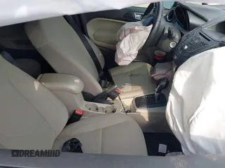 2015 Ford Fiesta SE z VIN 3FADP4BJ7FM223576, wystawiony jako IAAI lot #41505260 z przebiegiem 127 778 mil mil oraz . Historia ofert i sprzedaży dostępna na DreamBid. Obrazek 5.