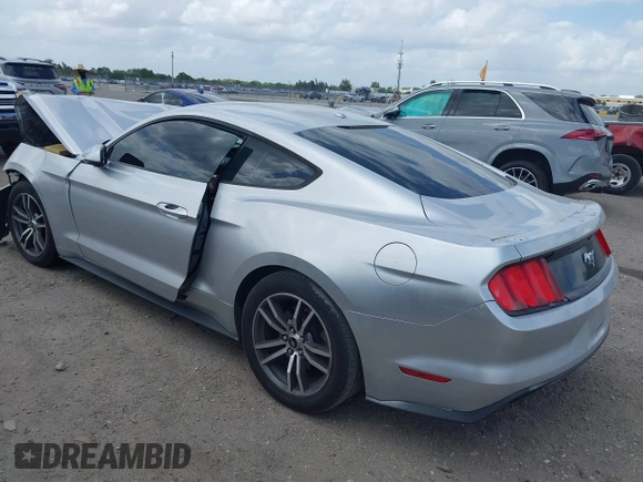 2016 Ford Mustang EcoBoost z VIN 1FA6P8TH5G5305096, wystawiony jako IAAI lot #41908211 z przebiegiem 106 585 mil mil oraz . Historia ofert i sprzedaży dostępna na DreamBid. Obrazek 3.