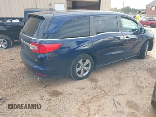 2019 Honda Odyssey EX-L with VIN 5FNRL6H72KB090503, listed as a IAAI auction lot 40958508 with 101,597 mi miles. Bid and sale history available at carsss.com. Image 4.
