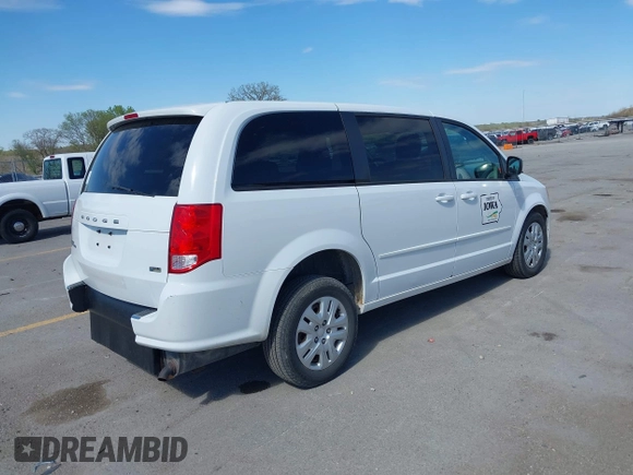 2014 Dodge Grand Caravan American Value with VIN 2C4RDGBG8ER140342, listed as a IAAI auction lot 42198306 with 135,564 mi miles and . Bid and sale history available at DreamBid. Image 4.