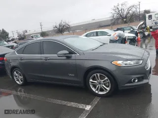 2015 Ford Fusion Energi Titanium with VIN 3FA6P0SU2FR173958, listed as a IAAI auction lot 41504220 with 170,235 mi miles. Bid and sale history available at carsss.com. Image 13.