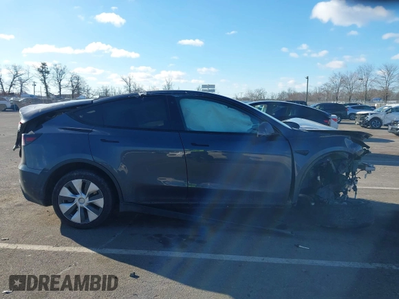 2020 Tesla Model Y Long Range with VIN 5YJYGDEE4LF030103, listed as a IAAI auction lot 41328929 with 64,896 mi miles and . Bid and sale history available at DreamBid. Image 13.