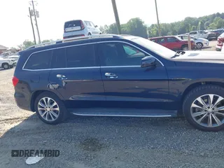 2014 Mercedes-Benz GL 450 с VIN 4JGDF7CE6EA325717, выставлен на аукционе IAAI как лот 42567112 с пробегом 131 186 миль миль и . История ставок и продаж доступна на DreamBid. Изображение 13.