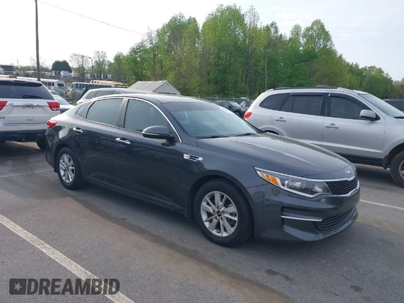 2016 Kia Optima LX with VIN KNAGT4L33G5107444, listed as a IAAI auction lot 41971006 with 174,997 mi miles. Bid and sale history available at carsss.com. Image 1.