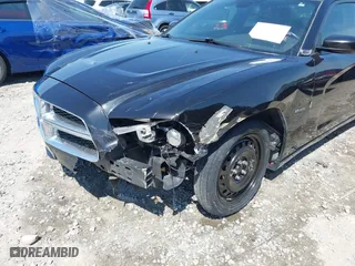 2011 Dodge Charger Road/Track with VIN 2B3CL5CT8BH506814, listed as a IAAI auction lot 41890437 with 240,836 mi miles. Bid and sale history available at carsss.com. Image 6.