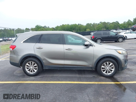 2016 Kia Sorento LX with VIN 5XYPGDA51GG012335, listed as a IAAI auction lot 42224249 with 166,752 mi miles and . Bid and sale history available at DreamBid. Image 13.