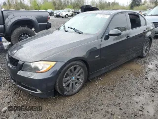 2007 BMW 3 Series 328xi with VIN WBAVC93517KX58143, listed as a Copart auction lot 52036035 with 161,954 mi miles and Salvage title. Bid and sale history available at DreamBid. Image 1.