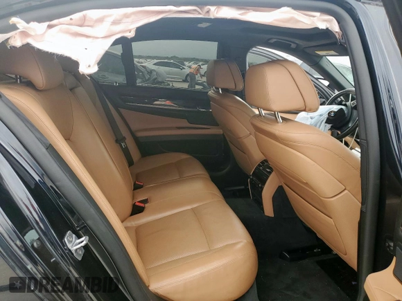 2015 BMW 7 Series 750i xDrive с VIN WBAYB6C55FD966172, выставлен на аукционе Copart как лот 55086405 с пробегом Не указан миль и Списание • Salvage title. История ставок и продаж доступна на DreamBid. Изображение 10.