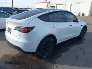 2021 Tesla Model Y Long Range with VIN 5YJYGDEE3MF098586, listed as a IAAI auction lot 40939802 with Not Provided miles and . Bid and sale history available at DreamBid. Image 4.