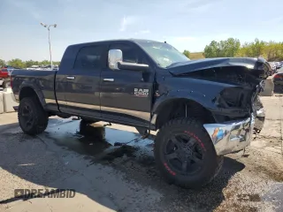 2014 Ram 2500 Laramie with VIN 3C6UR5NL5EG144483, listed as a Copart auction lot 73720324 with 137,360 mi miles and Salvage title. Bid and sale history available at DreamBid. Image 4.