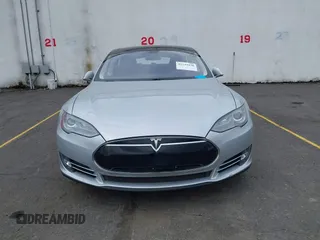 2014 Tesla Model S 60 with VIN 5YJSA1S13EFP53662, listed as a IAAI auction lot 42249930 with Not provided miles and . Bid and sale history available at DreamBid. Image 11.