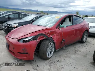 2021 Tesla Model Y Long Range z VIN 5YJYGDEEXMF175180, wystawiony jako Copart lot #55167345 z przebiegiem Nie podano mil oraz Szkoda całkowita • Salvage title. Historia ofert i sprzedaży dostępna na DreamBid. Obrazek 1.