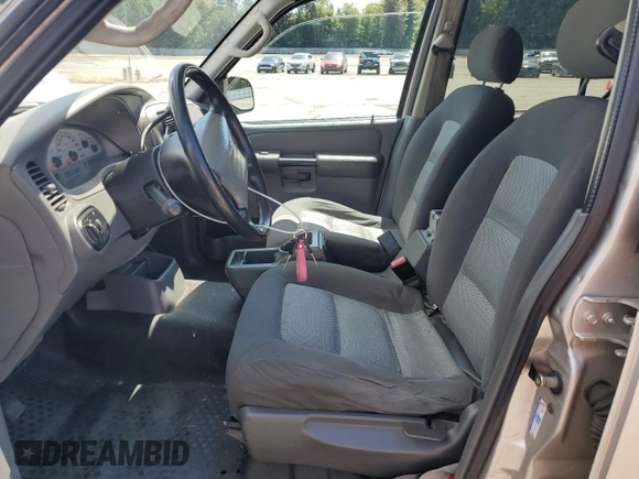 2005 Ford Explorer Sport Trac XLS с VIN 1FMZU67K85UA18120, выставлен на аукционе Copart как лот 64631455 с пробегом 180 021 миль миль и Списание • Salvage title. История ставок и продаж доступна на DreamBid. Изображение 7.