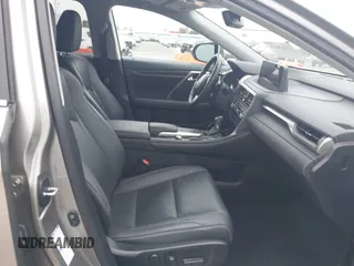 2021 Lexus RX 450h with VIN 2T2HGMDA3MC060208, listed as a IAAI auction lot 42163455 with 34,167 mi miles and . Bid and sale history available at DreamBid. Image 5.