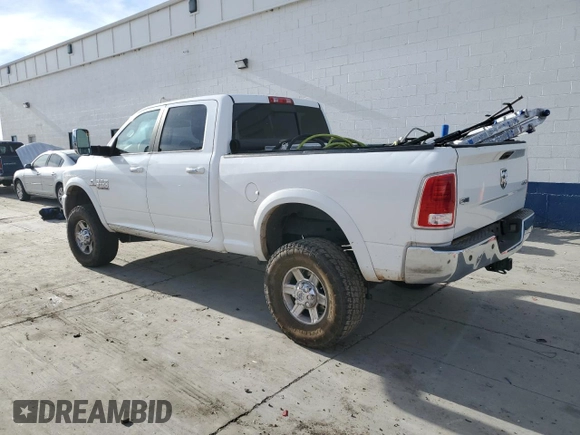 2014 Ram 2500 Laramie with VIN 3C6UR5FL3EG177142, listed as a Copart auction lot 84634854 with Not Provided miles and Salvage Title. Bid and sale history available at carsss.com. Image 2.
