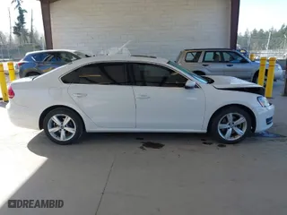 2012 Volkswagen Passat SE w/Sunroof with VIN 1VWBP7A32CC025052, listed as a IAAI auction lot 41960259 with 46,478 mi miles. Bid and sale history available at carsss.com. Image 13.