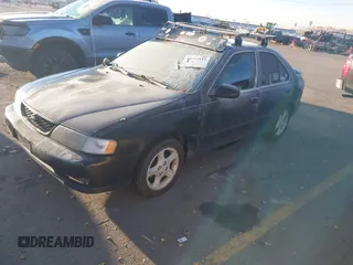1998 Nissan Sentra z VIN 1N4BB41D0WC753293, wystawiony jako IAAI lot #40903118 z przebiegiem 287 968 mil mil oraz . Historia ofert i sprzedaży dostępna na DreamBid. Obrazek 2.