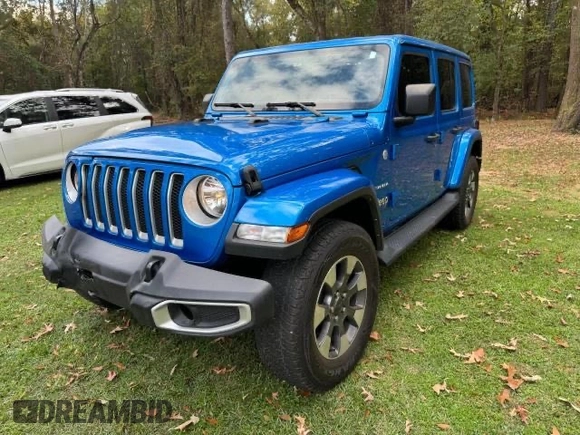 2022 Jeep Wrangler Unlimited Sahara with VIN 1C4HJXEG6NW248854, listed as a Copart auction lot 49020345 with 33,569 mi miles and Clean title. Bid and sale history available at DreamBid. Image 2.