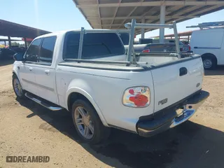 2001 Ford F-150 SuperCrew XLT with VIN 1FTRW07L51KC49955, listed as a IAAI auction lot 42035123 with 396,961 mi miles. Bid and sale history available at carsss.com. Image 3.
