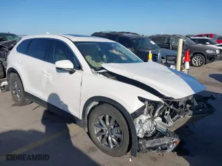 2018 Mazda CX-9 Touring with VIN JM3TCACY1J0216721, listed as a IAAI auction lot 41817553 with 77,669 mi miles. Bid and sale history available at carsss.com. Image 1.