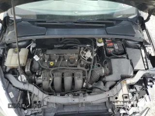 2017 Ford Focus SE with VIN 1FADP3F2XHL201380, listed as a Copart auction lot 56942815 with 136,169 mi miles and Salvage title. Bid and sale history available at DreamBid. Image 11.
