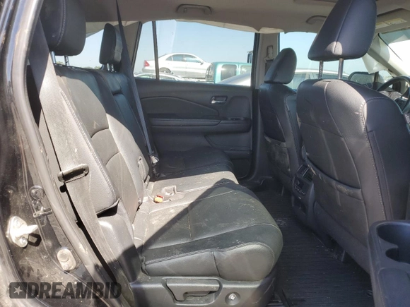 2017 Honda Pilot EX-L z VIN 5FNYF6H59HB092985, wystawiony jako Copart lot #55621225 z przebiegiem 86 510 mil mil oraz Szkoda całkowita • Salvage title. Historia ofert i sprzedaży dostępna na DreamBid. Obrazek 11.