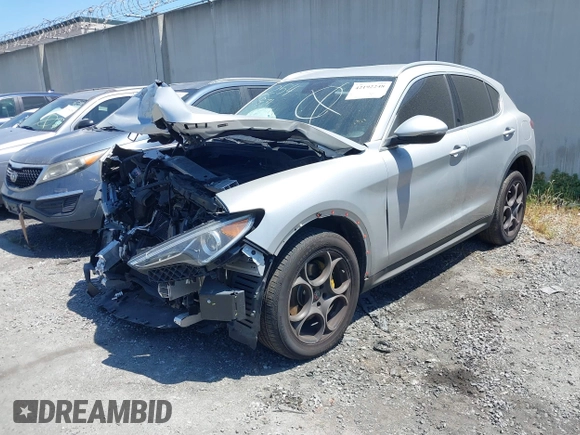 2018 Alfa Romeo Stelvio z VIN ZASFAKAN1J7B89142, wystawiony jako IAAI lot #42192248 z przebiegiem Nie podano mil oraz . Historia ofert i sprzedaży dostępna na DreamBid. Obrazek 23.