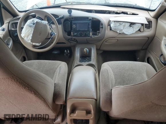 1997 Ford Expedition XLT with VIN 1FMEU17L5VLB80125, listed as a Copart auction lot 83892824 with 257,738 mi miles and Salvage title. Bid and sale history available at DreamBid. Image 8.