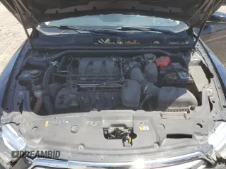2014 Ford Taurus SEL z VIN 1FAHP2E81EG127398, wystawiony jako Copart lot #56666105 z przebiegiem 96 693 mil mil oraz Szkoda całkowita • Salvage title. Historia ofert i sprzedaży dostępna na DreamBid. Obrazek 11.