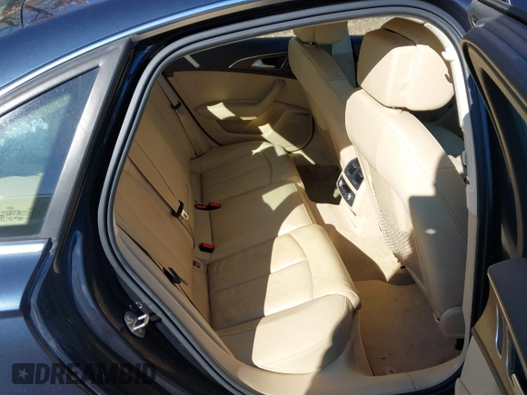 2014 Audi A6 Premium Plus z VIN WAUFGAFC4EN124454, wystawiony jako IAAI lot #41653231 z przebiegiem 145 751 mil mil oraz . Historia ofert i sprzedaży dostępna na DreamBid. Obrazek 8.