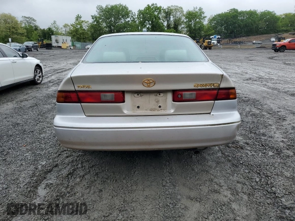 1997 Toyota Camry LE z VIN 4T1BG22K3VU819353, wystawiony jako Copart lot #58141275 z przebiegiem 32 935 mil mil oraz Czysty tytuł • Clean title. Historia ofert i sprzedaży dostępna na DreamBid. Obrazek 6.