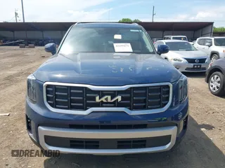2025 Kia Telluride S with VIN 5XYP64GC6SG581215, listed as a IAAI auction lot 42295271 with 17,941 mi miles and . Bid and sale history available at DreamBid. Image 6.