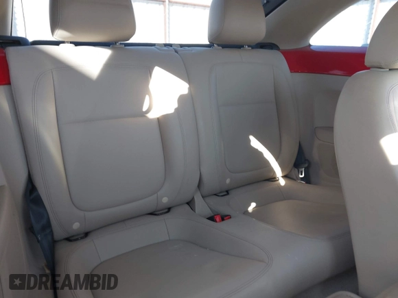2013 Volkswagen Beetle with VIN 3VWHX7AT3DM682758, listed as a IAAI auction lot 40869170 with 88,793 mi miles and . Bid and sale history available at DreamBid. Image 8.