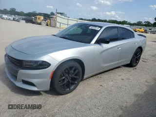 2019 Dodge Charger SXT with VIN 2C3CDXBG5KH703990, listed as a Copart auction lot 60326375 with 61,427 mi miles and Salvage title. Bid and sale history available at DreamBid. Image 1.