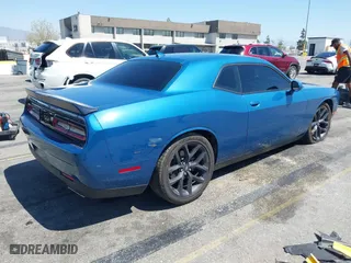 2023 Dodge Challenger GT with VIN 2C3CDZJG9PH662218, listed as a IAAI auction lot 42001149 with 3,852 mi miles. Bid and sale history available at carsss.com. Image 4.