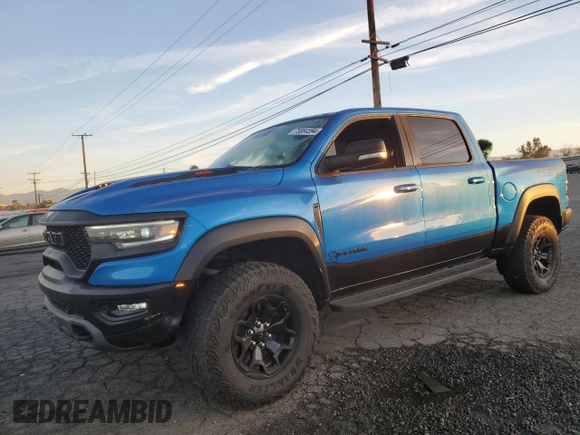 2021 Ram 1500 TRX with VIN 1C6SRFU98MN757772, listed as a Copart auction lot 49923465 with 27,250 mi miles and Salvage Title. Bid and sale history available at carsss.com. Image 1.