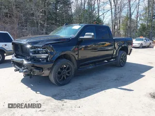 2022 Ram 2500 Laramie z VIN 3C6UR5FL0NG104956, wystawiony jako IAAI lot #41936160 z przebiegiem 57 188 mil mil oraz . Historia ofert i sprzedaży dostępna na DreamBid. Obrazek 2.