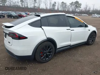 2022 Tesla Model X Plaid z VIN 7SAXCBE67NF339557, wystawiony jako IAAI lot #41825360 z przebiegiem 70 mil mil oraz . Historia ofert i sprzedaży dostępna na DreamBid. Obrazek 4.