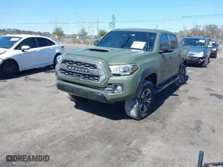 2016 Toyota Tacoma SR with VIN 3TMCZ5ANXGM038420, listed as a IAAI auction lot 41635372 with 113,723 mi miles. Bid and sale history available at carsss.com. Image 2.