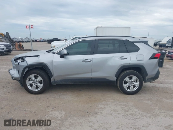 2020 Toyota RAV4 XLE with VIN 2T3W1RFV4LW094687, listed as a IAAI auction lot 42652039 with 56,693 mi miles and . Bid and sale history available at DreamBid. Image 14.