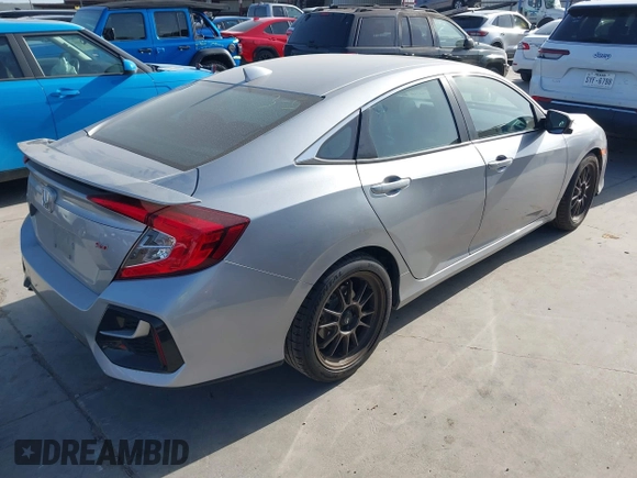 2020 Honda Civic Si with VIN 2HGFC1E57LH704323, listed as a IAAI auction lot 41742768 with 34,246 mi miles and . Bid and sale history available at DreamBid. Image 4.