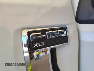 2021 Ford F-150 XL with VIN 1FTFX1E50MKF07538, listed as a IAAI auction lot 42785487 with 97,454 mi miles and . Bid and sale history available at DreamBid. Image 18.