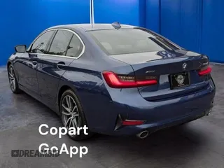 2021 BMW 3 Series 330i xDrive with VIN WBA5R7C05MFL07XXX, listed as a Copart auction lot 48625465 with 33,325 mi miles and Clean Title. Bid and sale history available at carsss.com. Image 3.