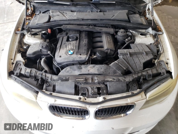 2012 BMW 1 Series 128i with VIN WBAUN1C5XCVH84372, listed as a Copart auction lot 54162815 with 127,420 mi miles and Clean title. Bid and sale history available at DreamBid. Image 11.