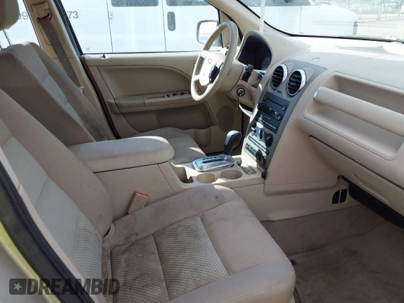 2005 Ford Freestyle SE with VIN 1FMZK01195GA48566, listed as a IAAI auction lot 41773209 with 139,037 mi miles. Bid and sale history available at carsss.com. Image 5.