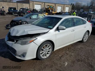 2013 Toyota Avalon XLE with VIN 4T1BK1EB4DU037825, listed as a IAAI auction lot 41963641 with 165,660 mi miles. Bid and sale history available at carsss.com. Image 2.